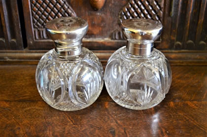 Pair of silver top scent bottles