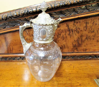 Silver mounted claret jug
