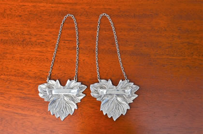 Pair of silver decanter lables