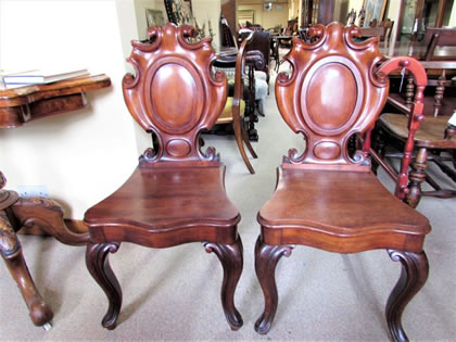 Pair mahogany hall chairs