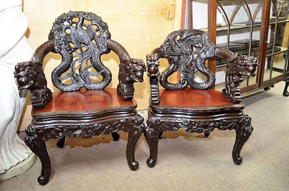Pair of carved chinese armchairs 