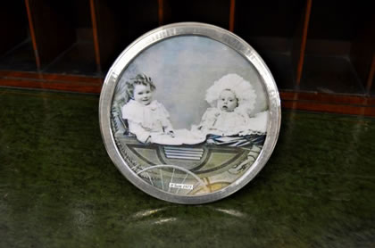 Circular silver photo frame