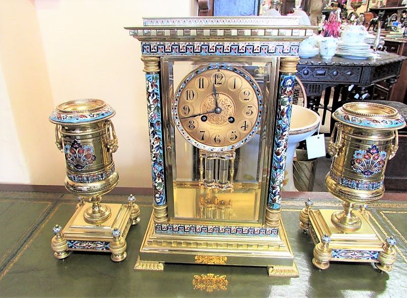Three piece french clossonie clock set with bevelled glass