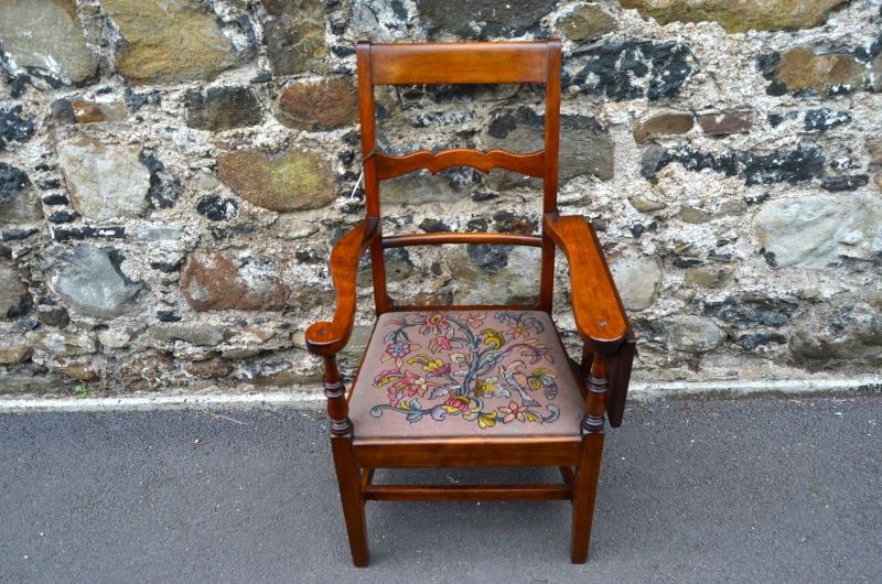 Oak armchair with folding rest