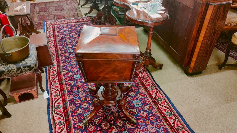 A 19th century mahogany tea-poy 