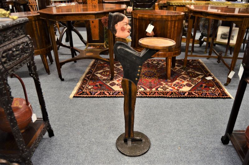 Wooden bellhop figure