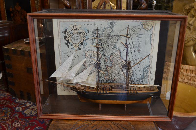 Glass cased model ship
