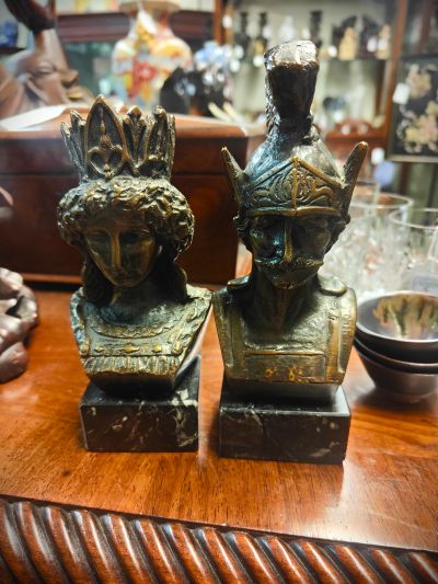 Pair of small bronze busts