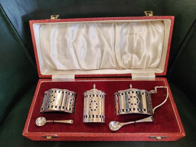 Five piece silver condiment set