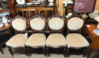 Four victorian mahogany armchairs
