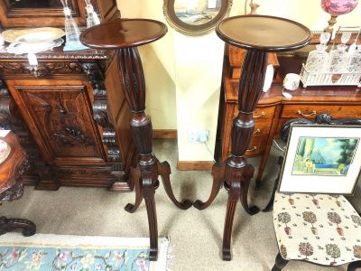Pair of mahogany Torcheres
