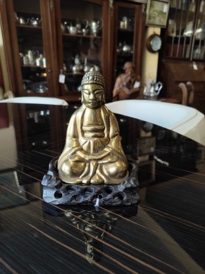 Chinese brass budda on stand