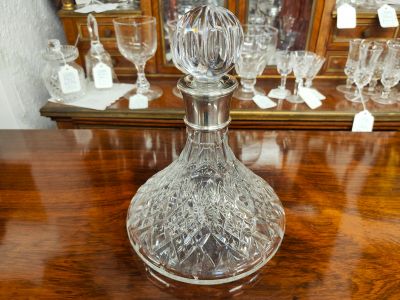 Silver mounted cut glass decanter