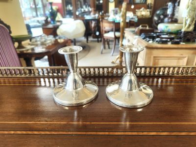 Pair of silver candlesticks