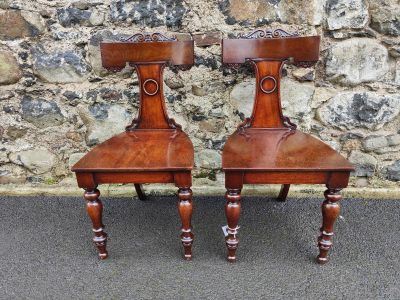 Pair of 19th century mahogany hall chairs 
