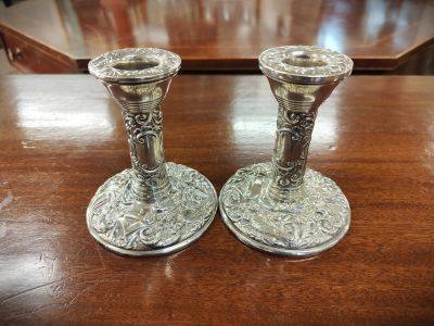 Pair of silver candlesticks 
