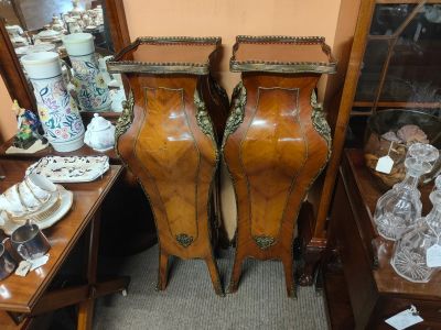 Pair of walnut pedestals with ormolu mounts