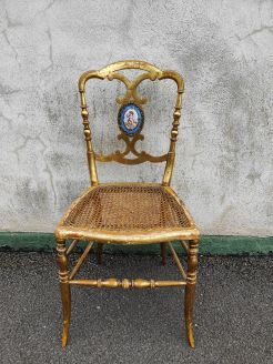 Victorian giltwood chair with wicker seat and porcelain inset