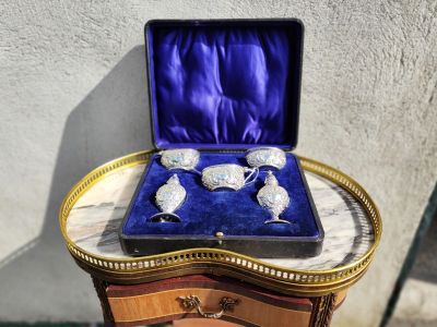 Seven piece silver condiment set