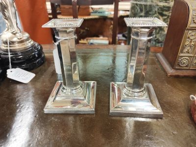 Pair of silver candlesticks