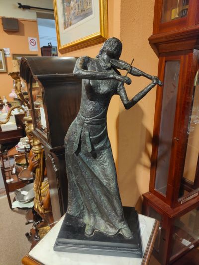 Bronze figure , signed