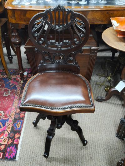 Mahogany swivel music chair