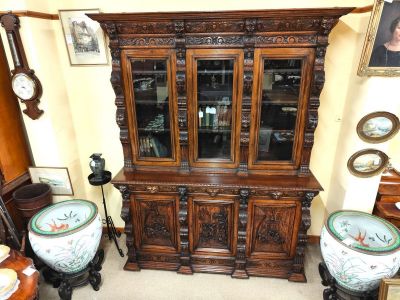 Three door carved oak bookcase