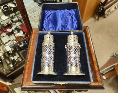 Pair of cased silver edwardian sugar castors