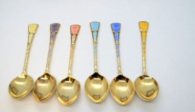 Six silver gilt coffee spoons