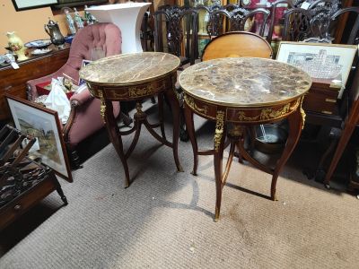 Pair of marble top tables with ormolu mounts