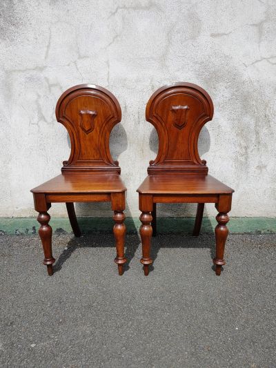 Pair of mahogany hall chairs