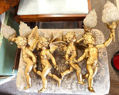 Set of gilt cherub lamps 