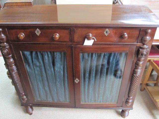 A regency mahogany side cabinet