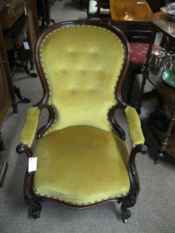 A victorian rosewood armchair