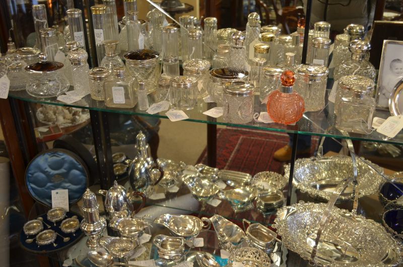 Various georgian ,victorian perfume bottles and photo frames