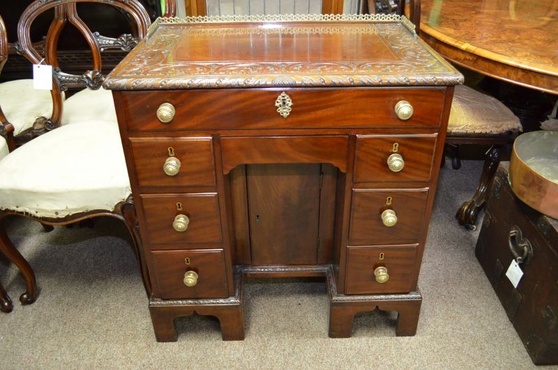 19th century mahogany desk with brass gallery