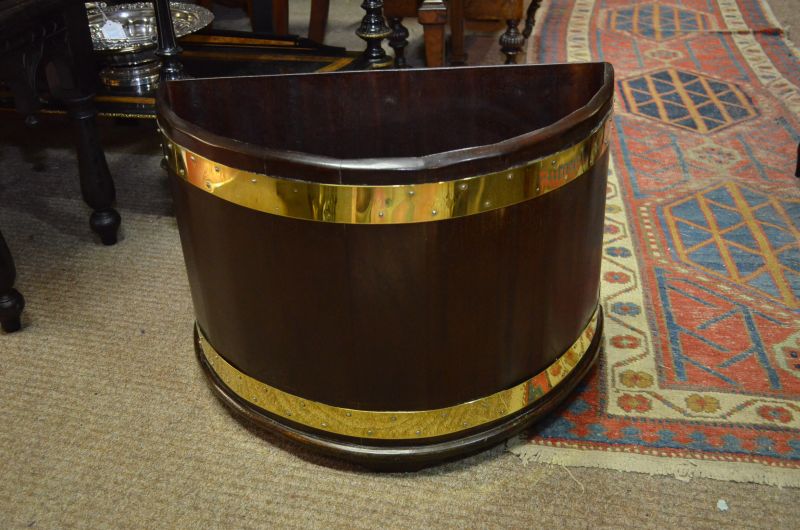 Georgian style mahogany and brass bound planter