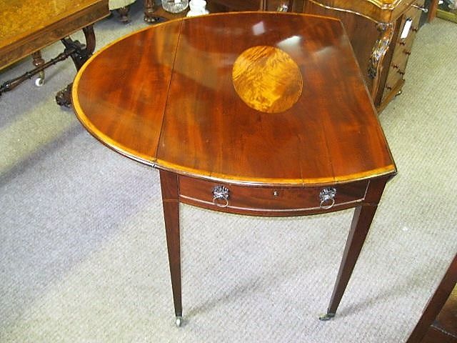Georgian pembroke table, on brass castors, circa 1800