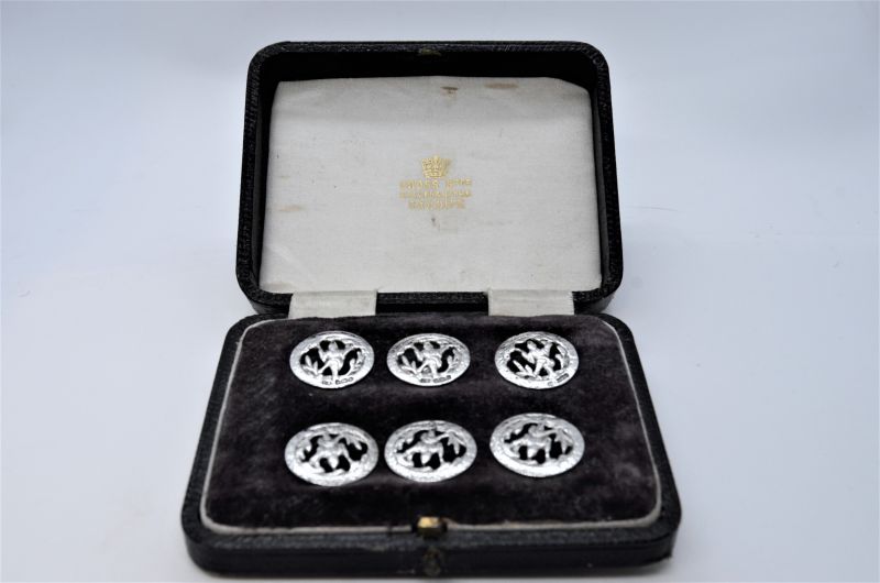 Cased silver buttons 