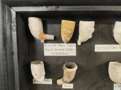 Framed collection of old pipes Thumbnail 4