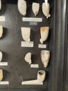 Framed collection of old pipes Thumbnail 6