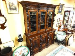 Three door carved oak bookcase Thumbnail 2