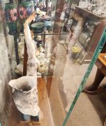 saxaphone plaster sculpture in glass display case Thumbnail 3