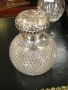 A silver topped perfume bottle Thumbnail 2