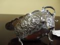 A silver sauce boat. Thumbnail 2