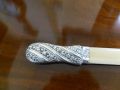 Silver and Ivory Page Turner Thumbnail 2